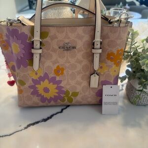 Coach Beige Tote with Purple and Yellow Floral Design